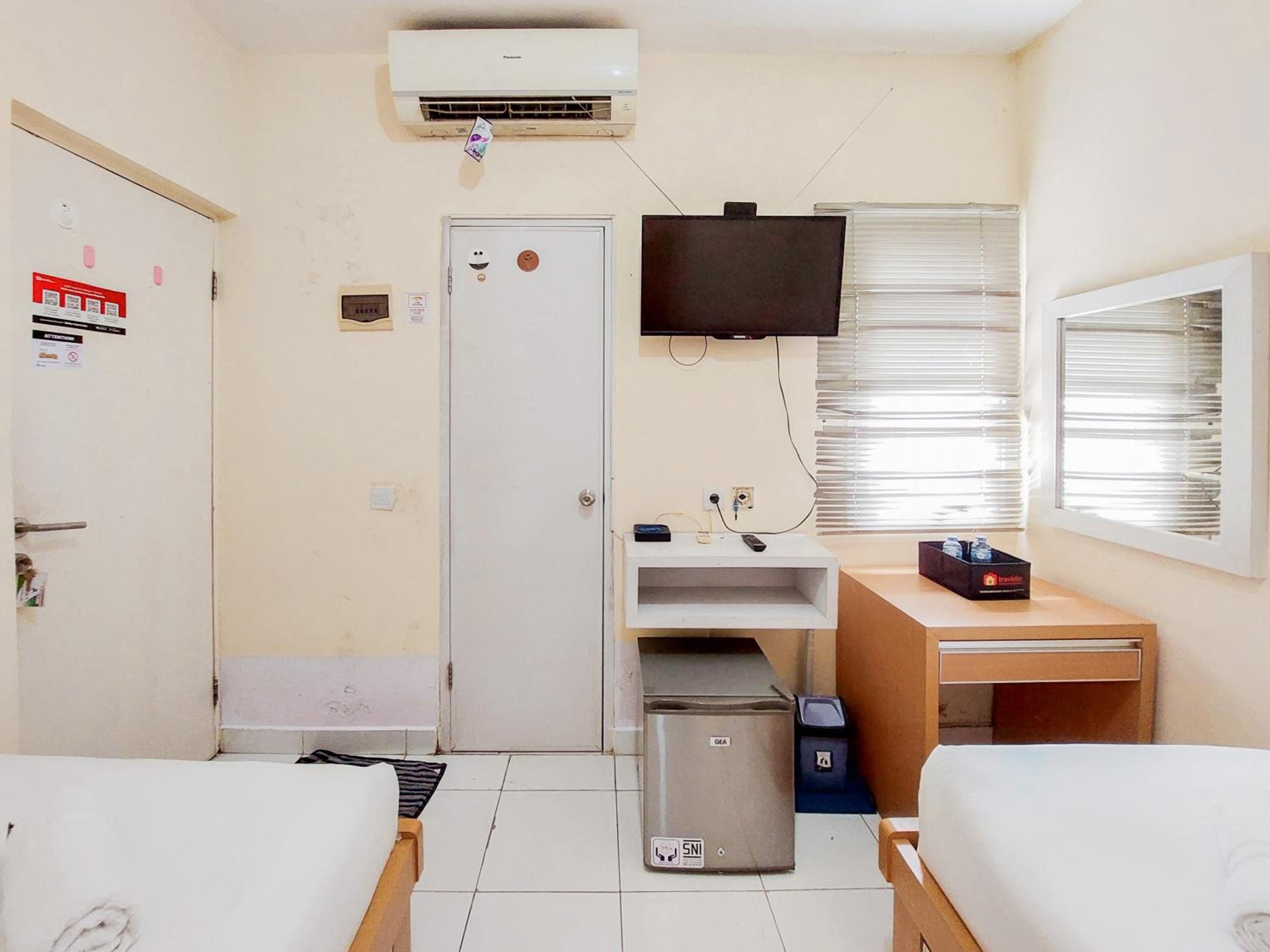 Compact Studio No Kitchen Apartment at Aeropolis Residence By Travelio view 4