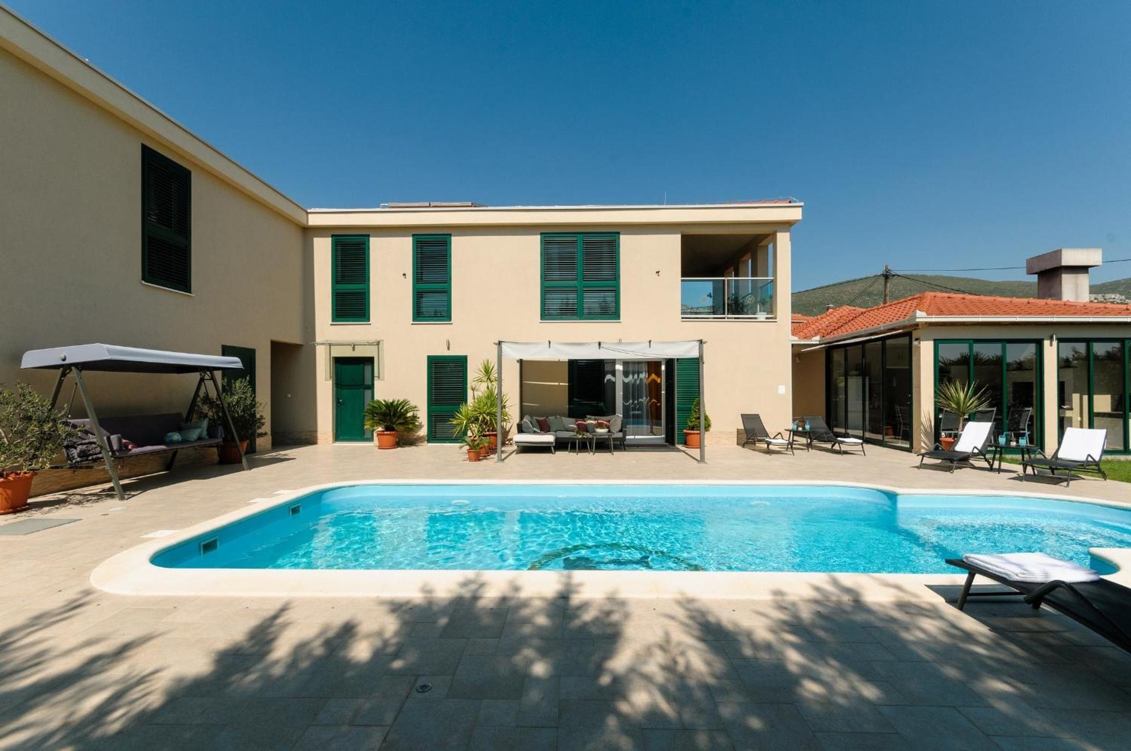 Luxury Villa with Heated Pool, Terrace, and Outdoor Amenities for Relaxation