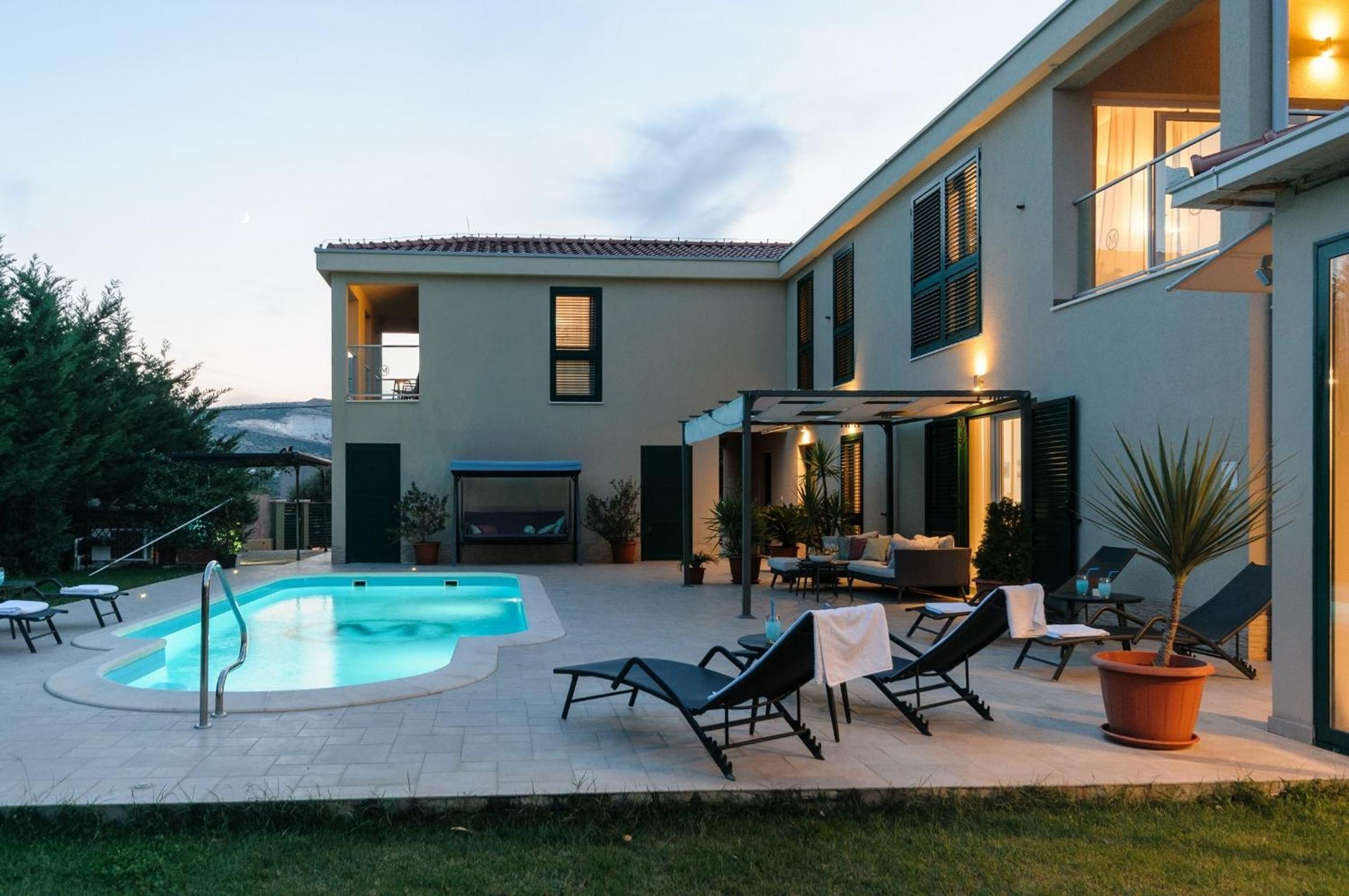 Luxury Villa with Heated Pool, Terrace, and Outdoor Amenities for Relaxation