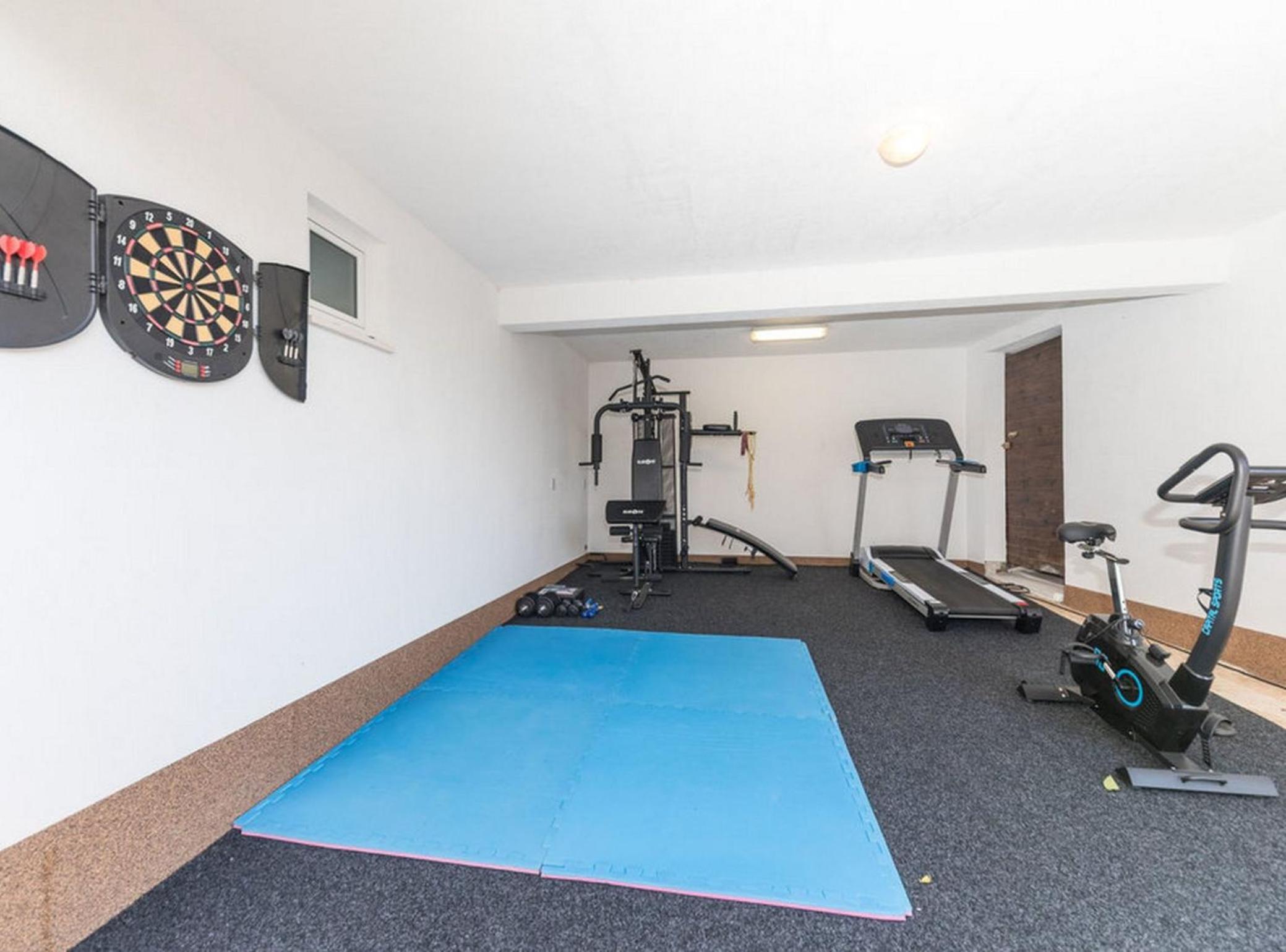 Relaxing Holiday Home with Pool, Fitness Area, and Entertainment Facilities view 4