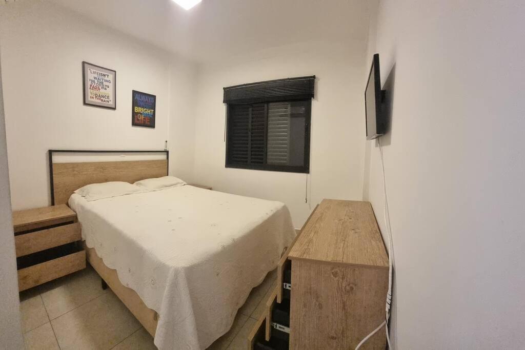Flat aconchegante na praia com vista para a mata