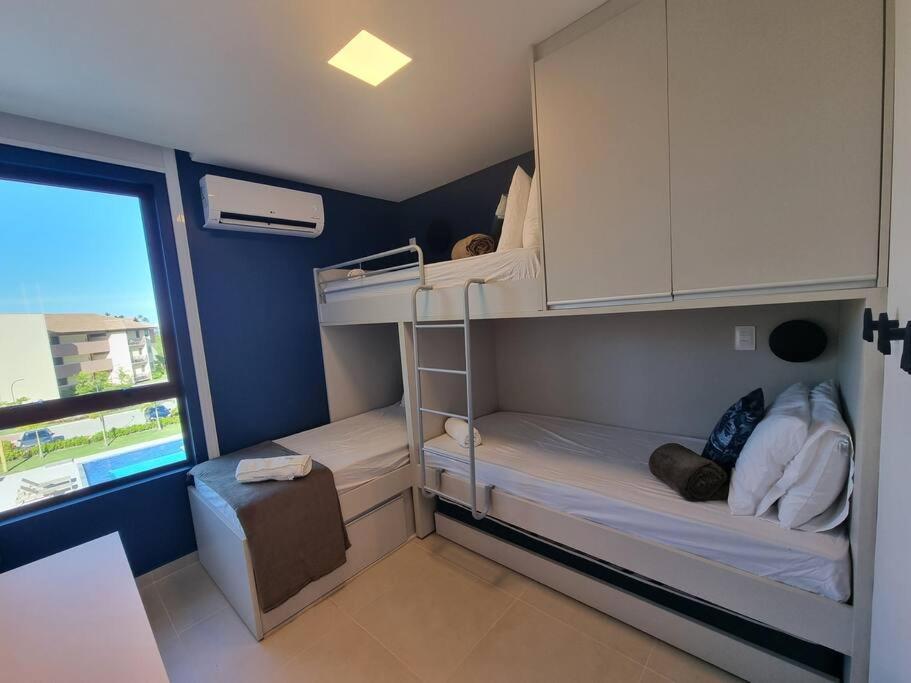303D Apartamento dois quartos Condomínio Beira Mar