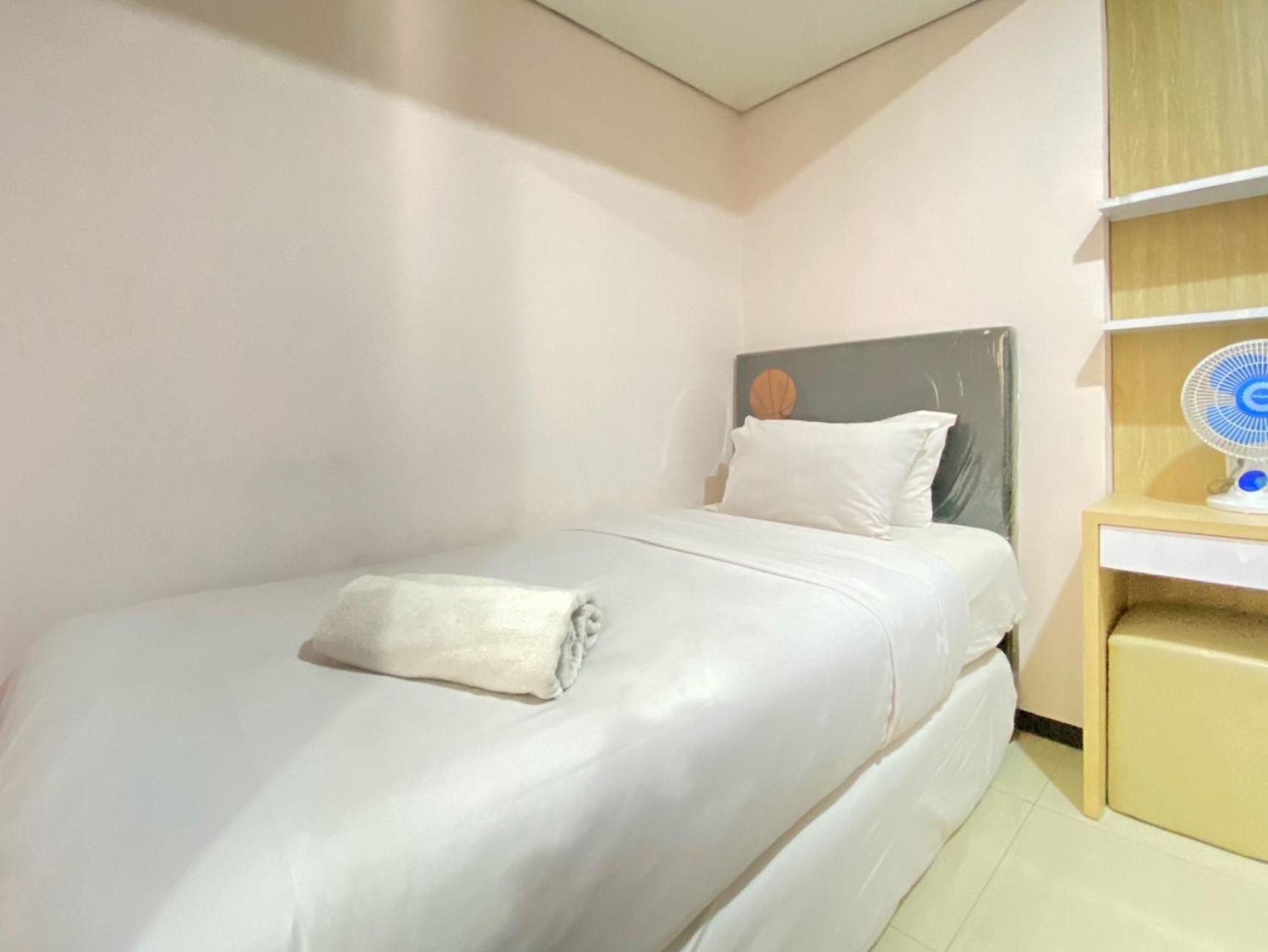 Homey and Cozy 2BR at Gateway Pasteur Apartment By Travelio view 4