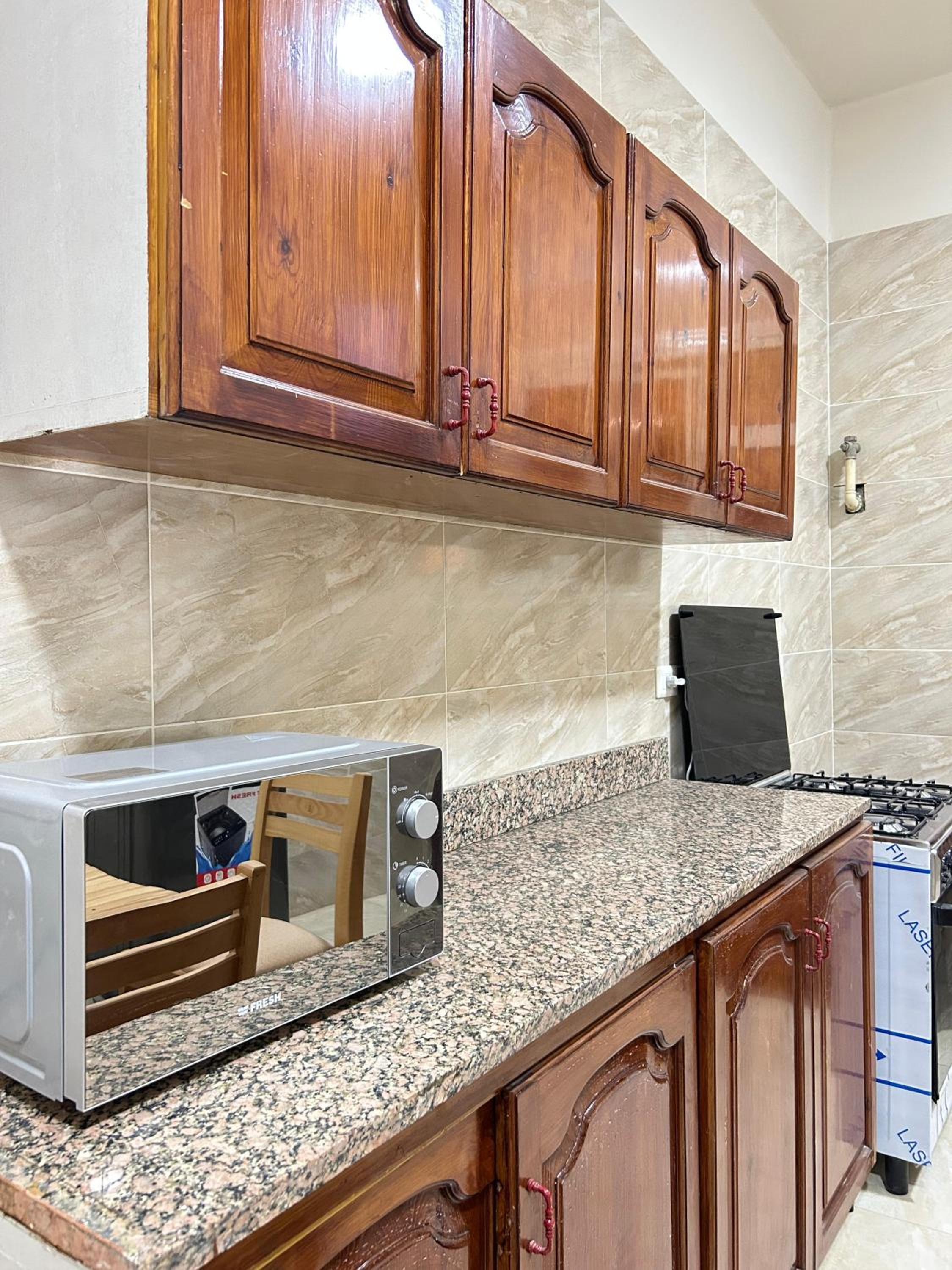 Modern 2BR Apartment Masr El Gedida Prime Spot