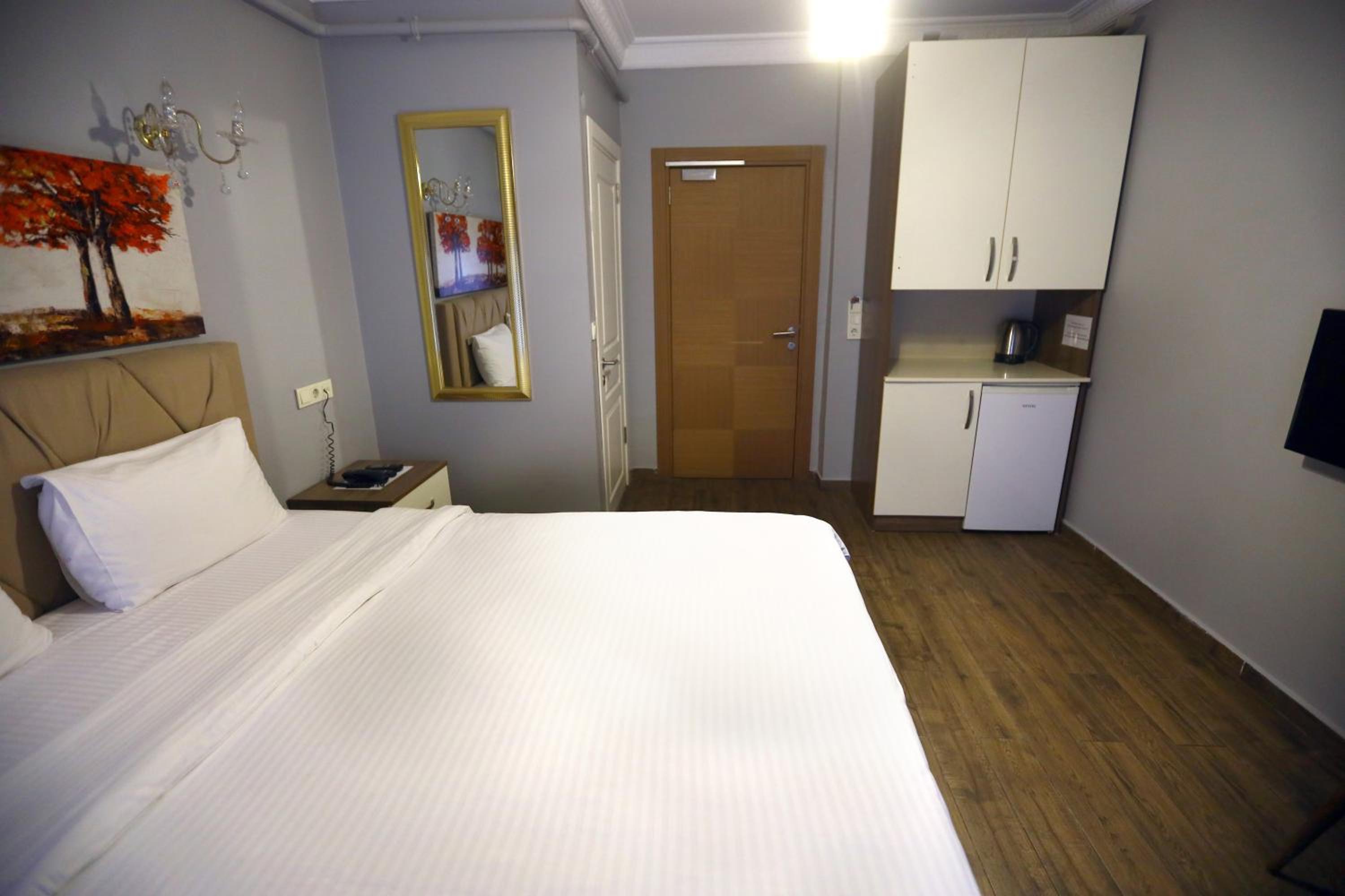 Zendy Suite Otel - Image 11