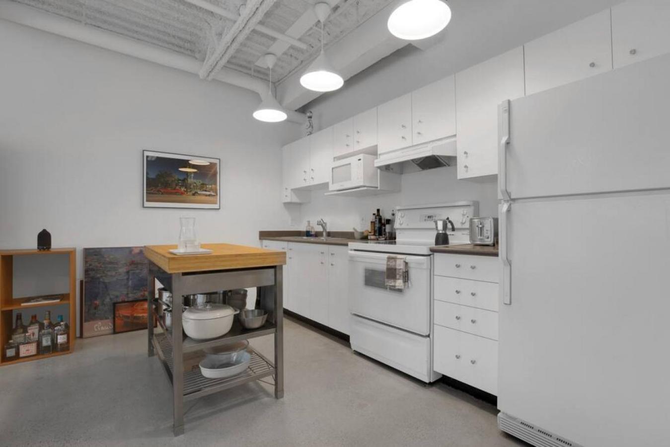 Modern and Specious Condo right off Main St