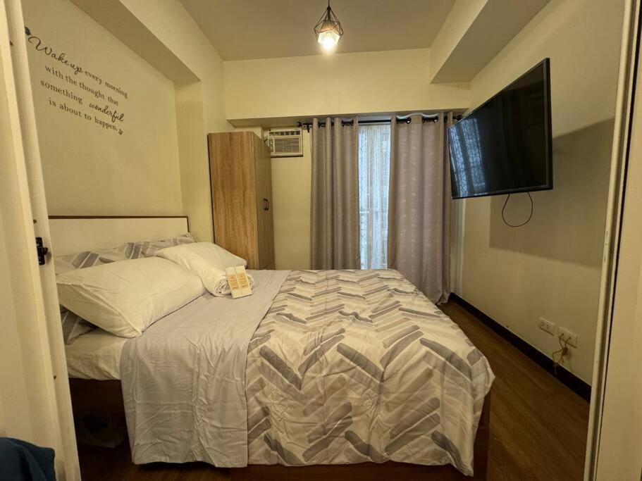 Lumiere Pasig - 1BR East Wifi & Netflix view 3