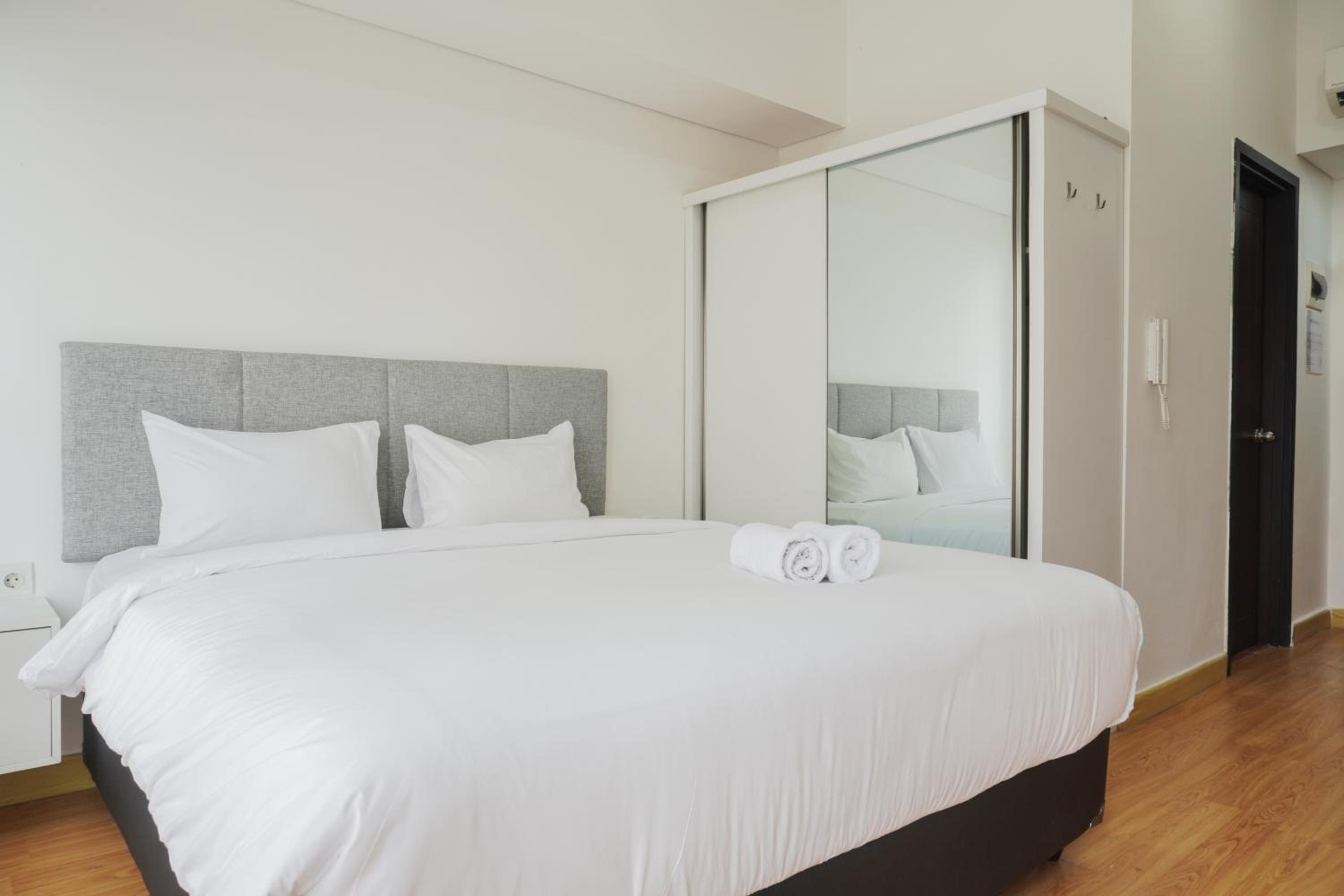 Nice and Cozy Studio Room at Casa De Parco Apartment By Travelio view 2