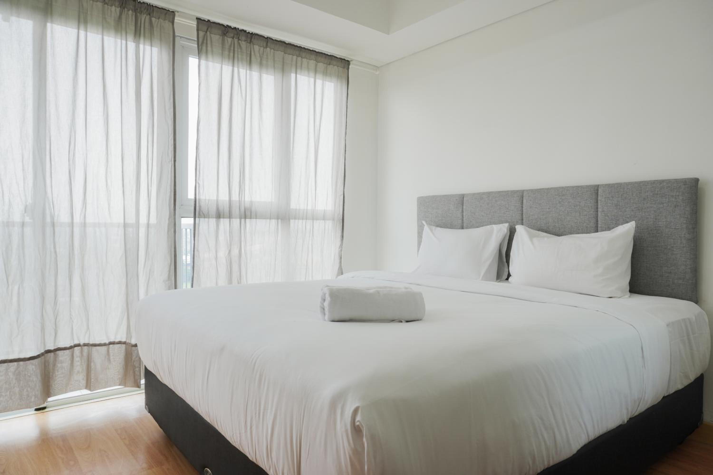 Nice and Cozy Studio Room at Casa De Parco Apartment By Travelio view 3