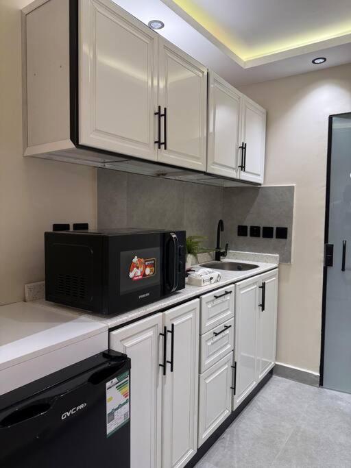 Serenity Stay 1BR Apartment Almasif