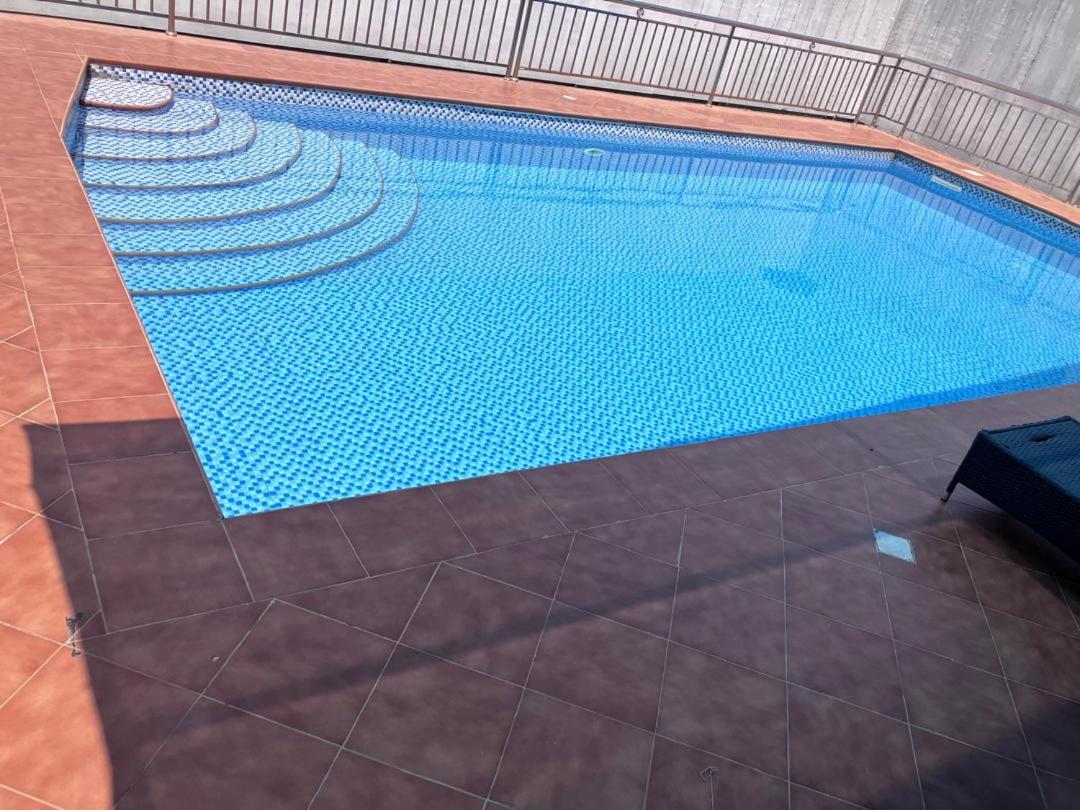 Elegant 2-Bedroom Retreat with Pool in Quiet Osu view 3