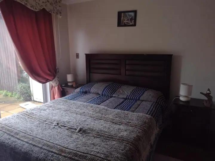 Amplia habitación con baño privado en mi casa