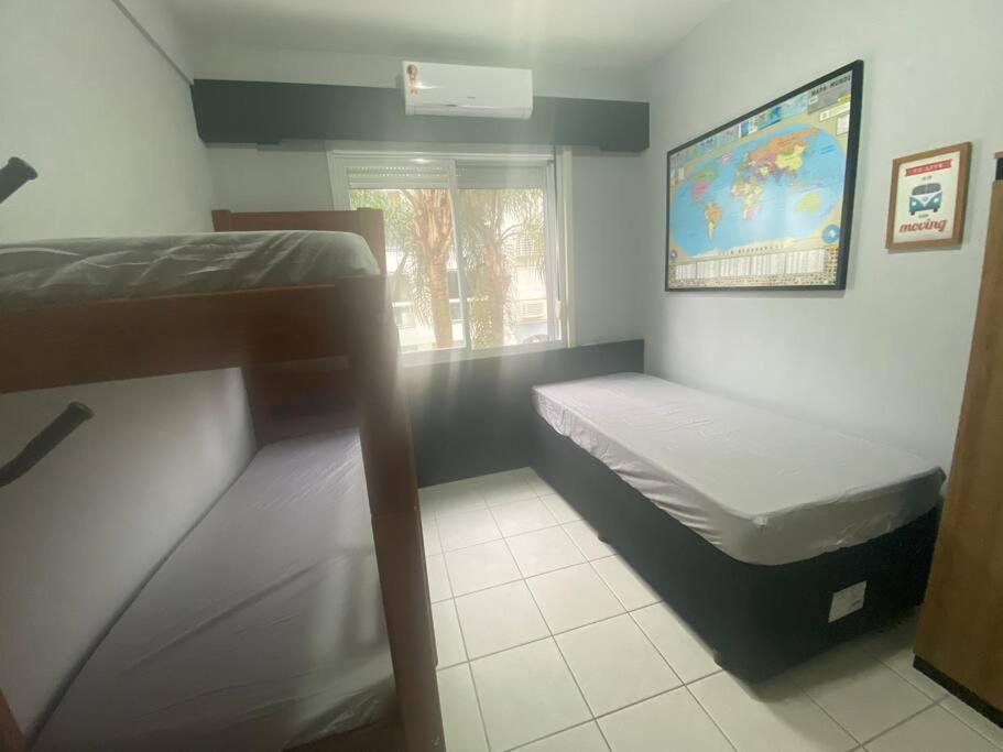 Apartamento encantador com piscina, em frente praia