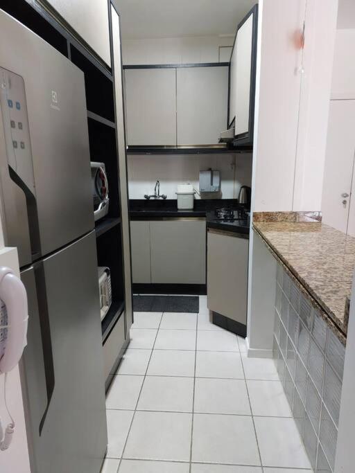 Apartamento encantador com piscina, em frente praia