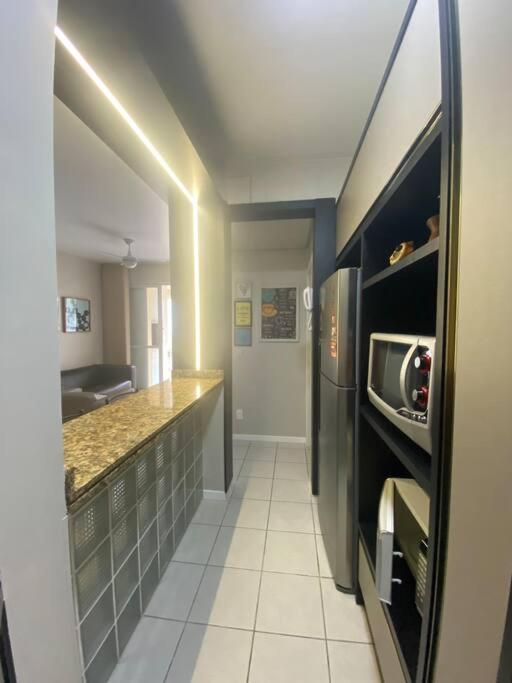 Apartamento encantador com piscina, em frente praia