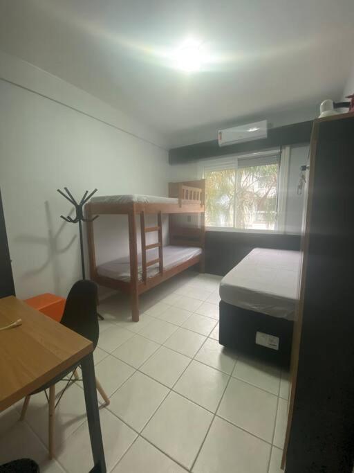 Apartamento encantador com piscina, em frente praia