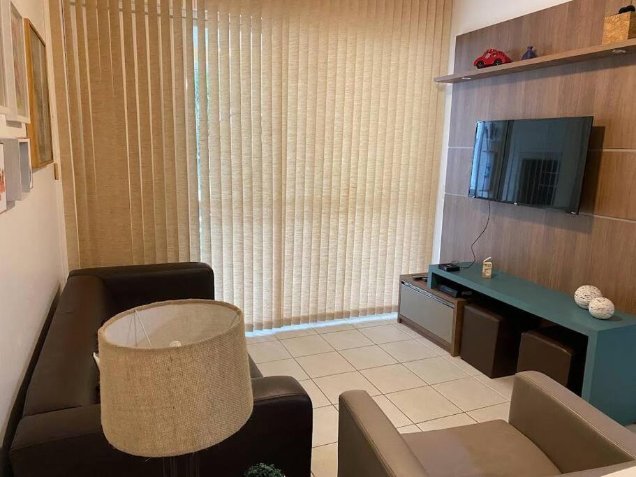 Apartamento encantador com piscina, em frente praia