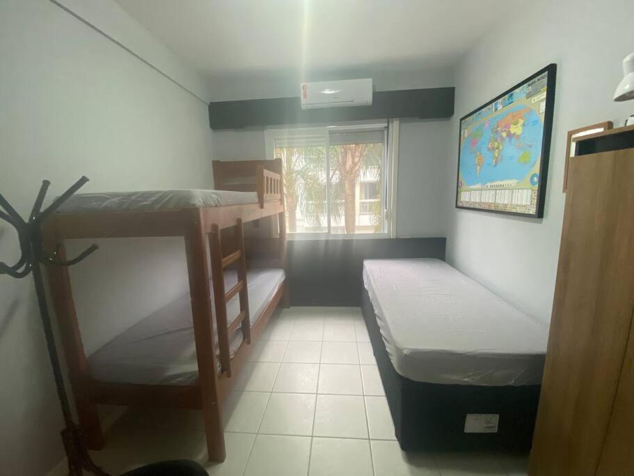 Apartamento encantador com piscina, em frente praia