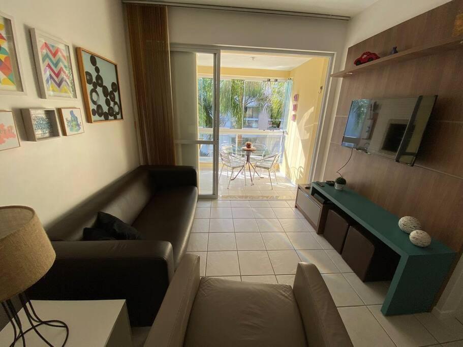 Apartamento encantador com piscina, em frente praia