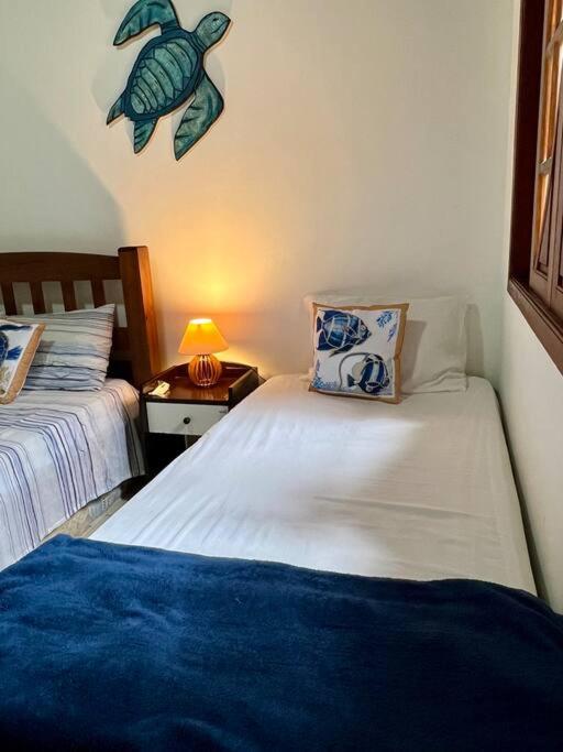 Casa espetacular em Búzios, 4 quartos, piscina, churrasqueira