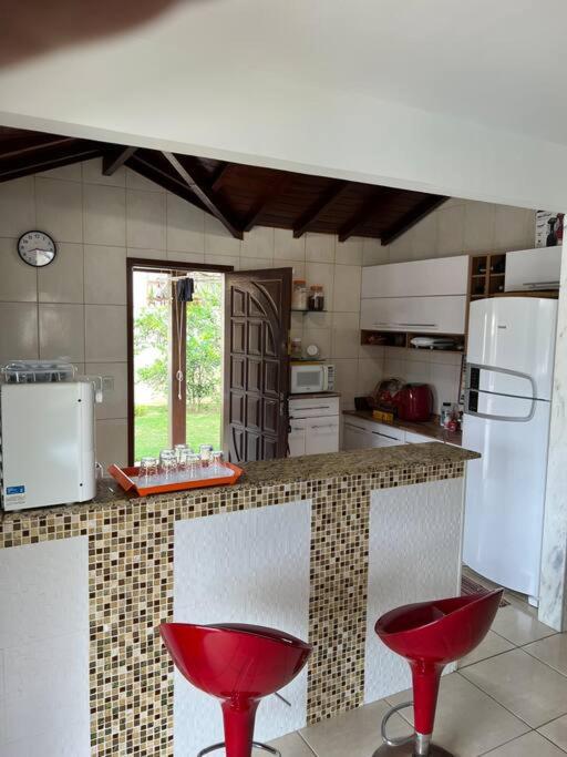Casa espetacular em Búzios, 4 quartos, piscina, churrasqueira
