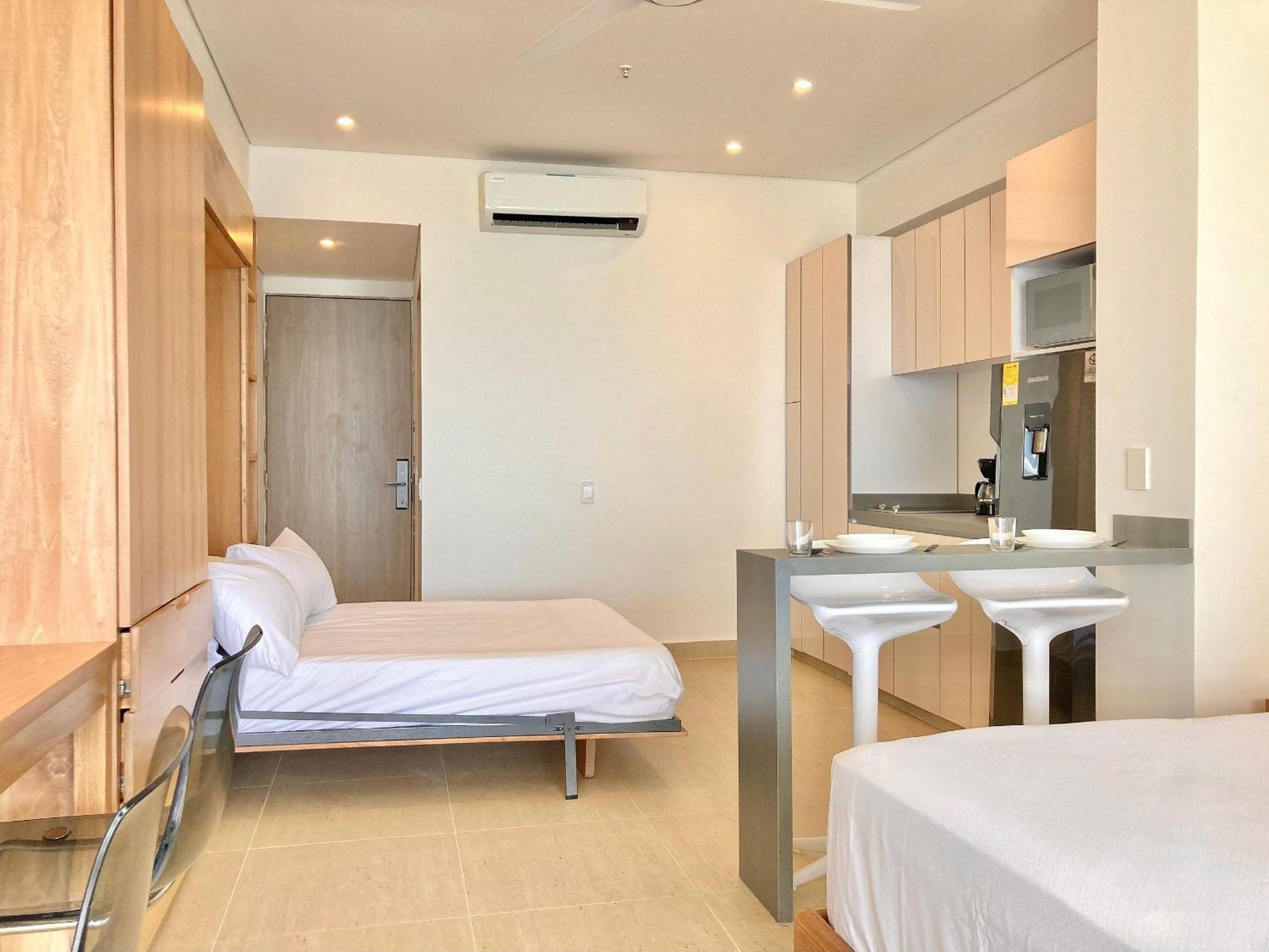 Suite vista al mar con hamaca y 2 camas queen p 12