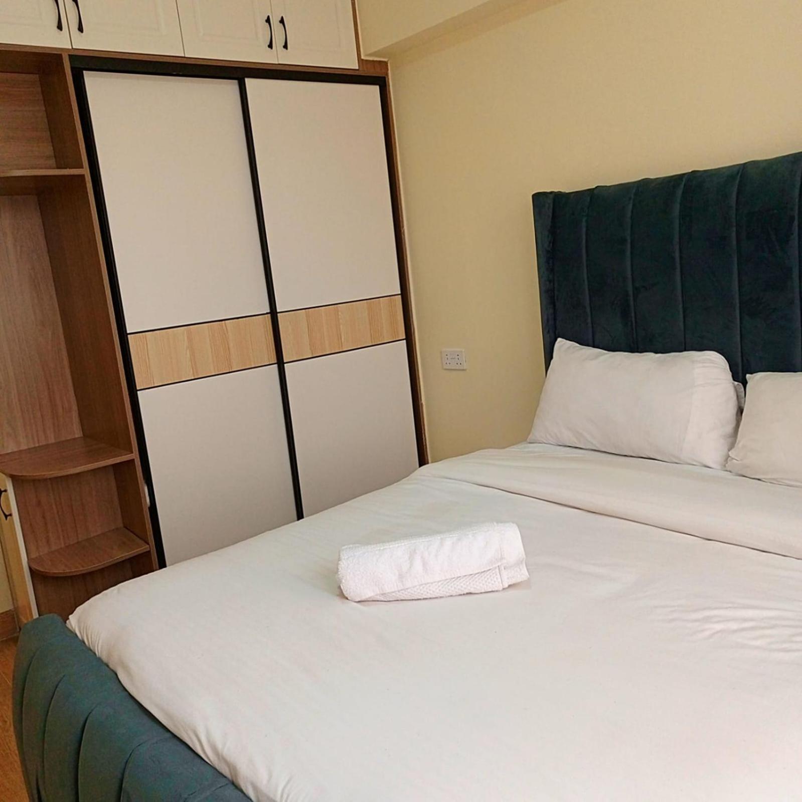Enzi heights luxurious 2 bedroom furnished and serviced apartment with a pool,gym and playground