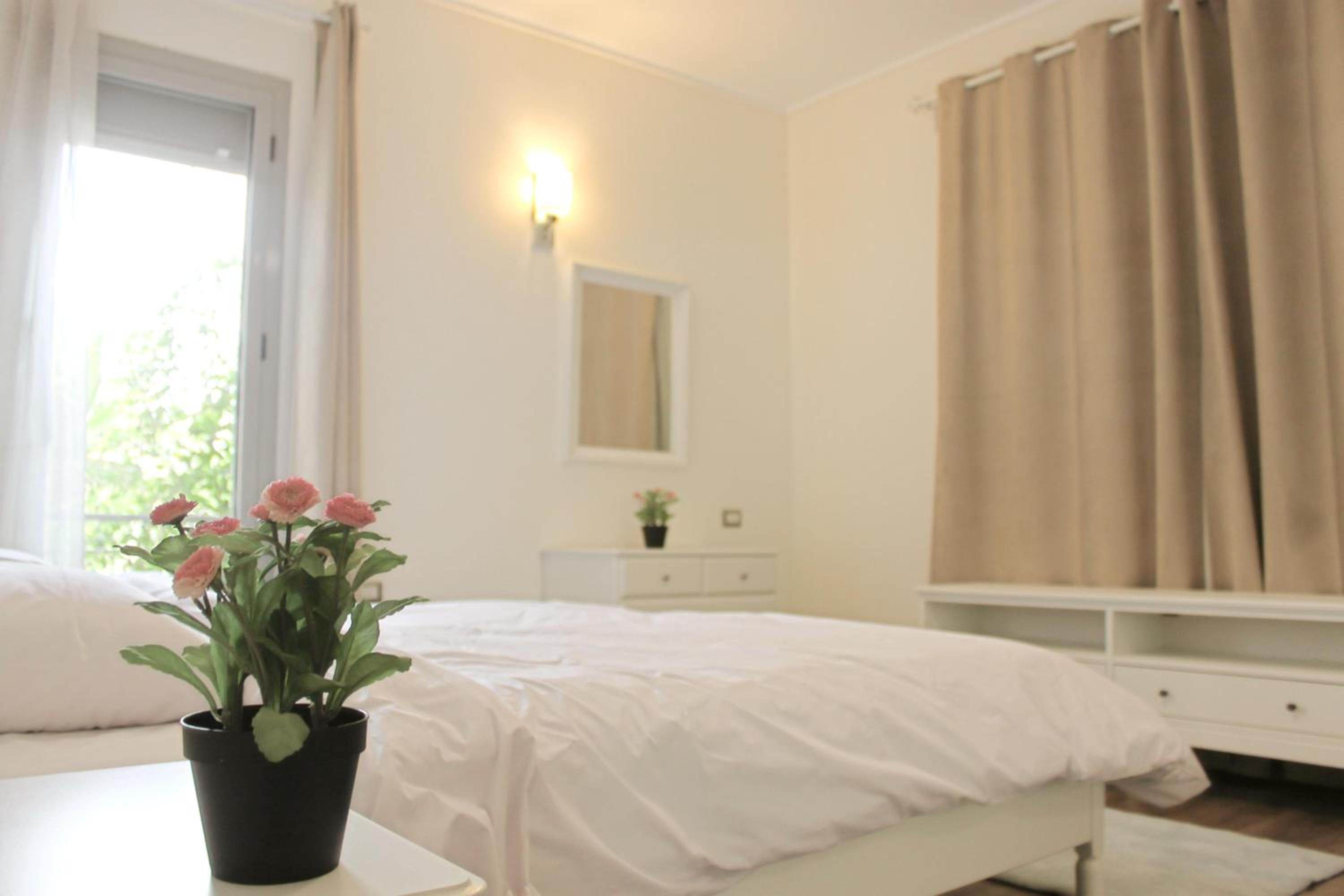 Private Garden 1BR Apt in Palm Hills AUC New Cairo