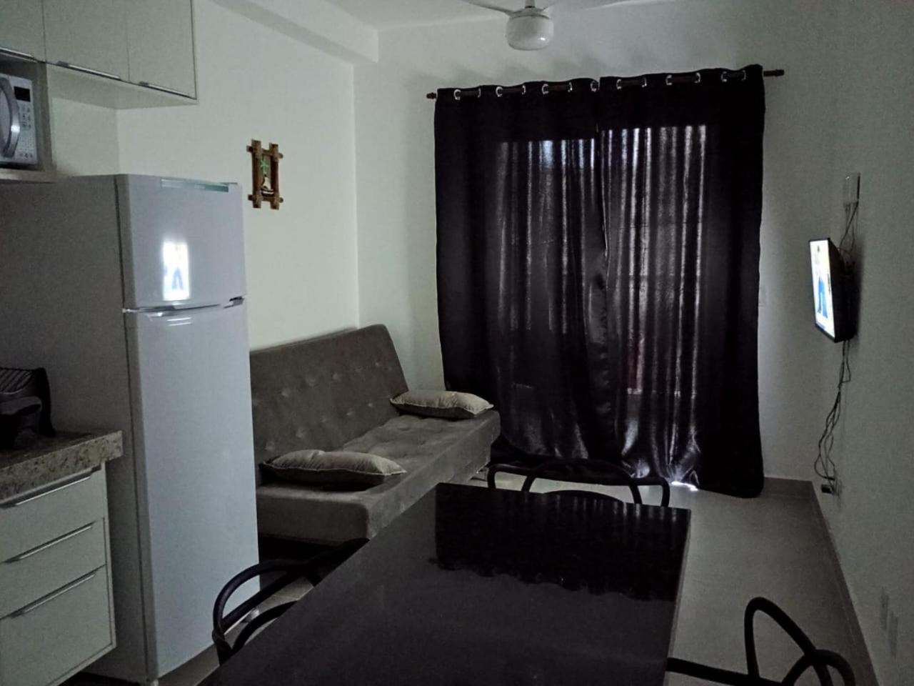 Apartamento 29 aconchegante de 1 quarto na PRAIA GRANDE, recém construido