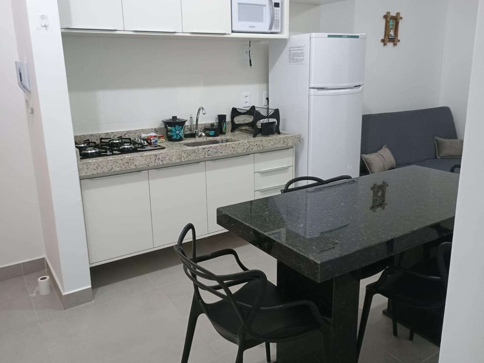 Apartamento 29 aconchegante de 1 quarto na PRAIA GRANDE, recém construido