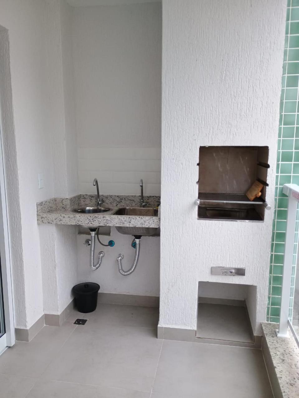 Apartamento 29 aconchegante de 1 quarto na PRAIA GRANDE, recém construido