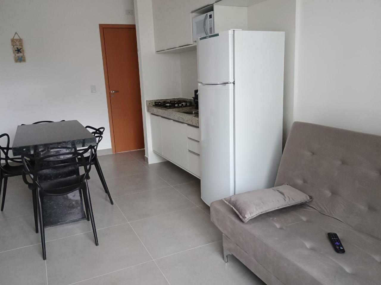Apartamento 29 aconchegante de 1 quarto na PRAIA GRANDE, recém construido