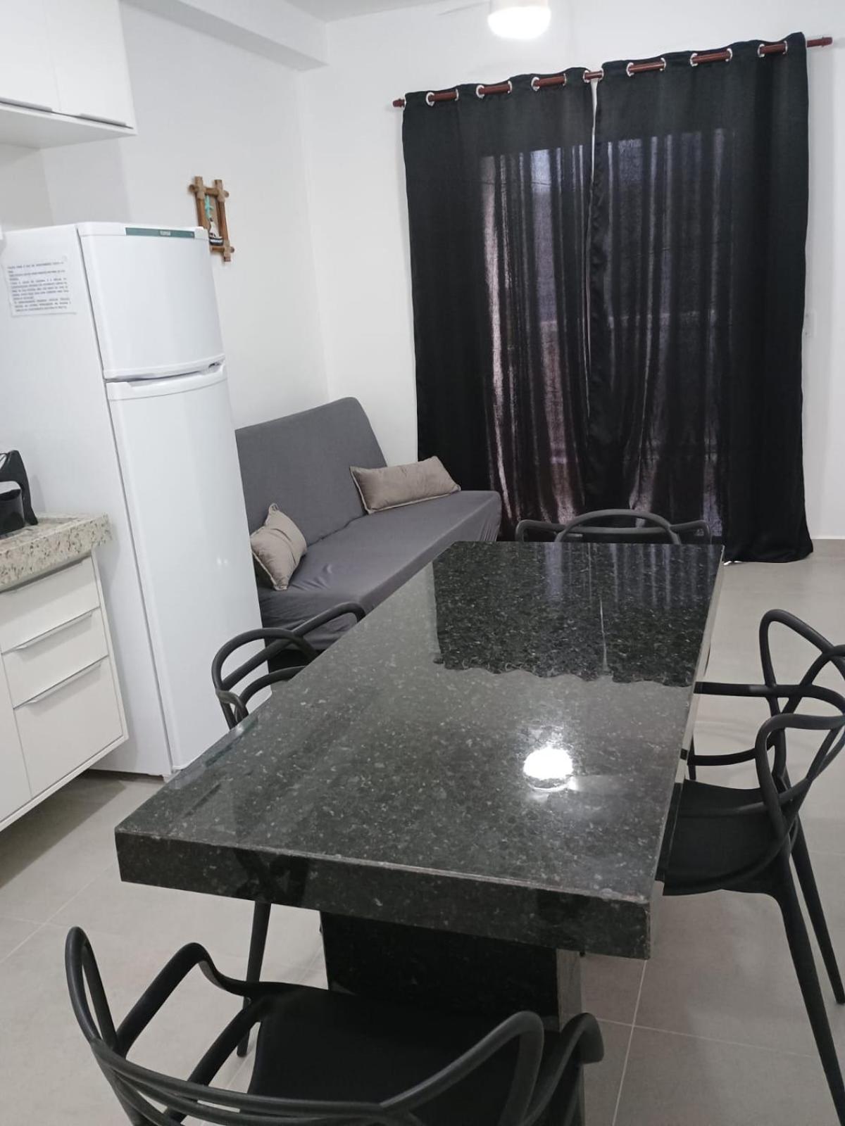 Apartamento 29 aconchegante de 1 quarto na PRAIA GRANDE, recém construido