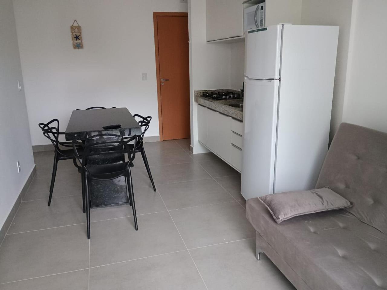 Apartamento 29 aconchegante de 1 quarto na PRAIA GRANDE, recém construido