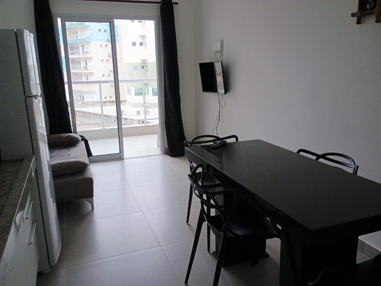 Apartamento 29 aconchegante de 1 quarto na PRAIA GRANDE, recém construido