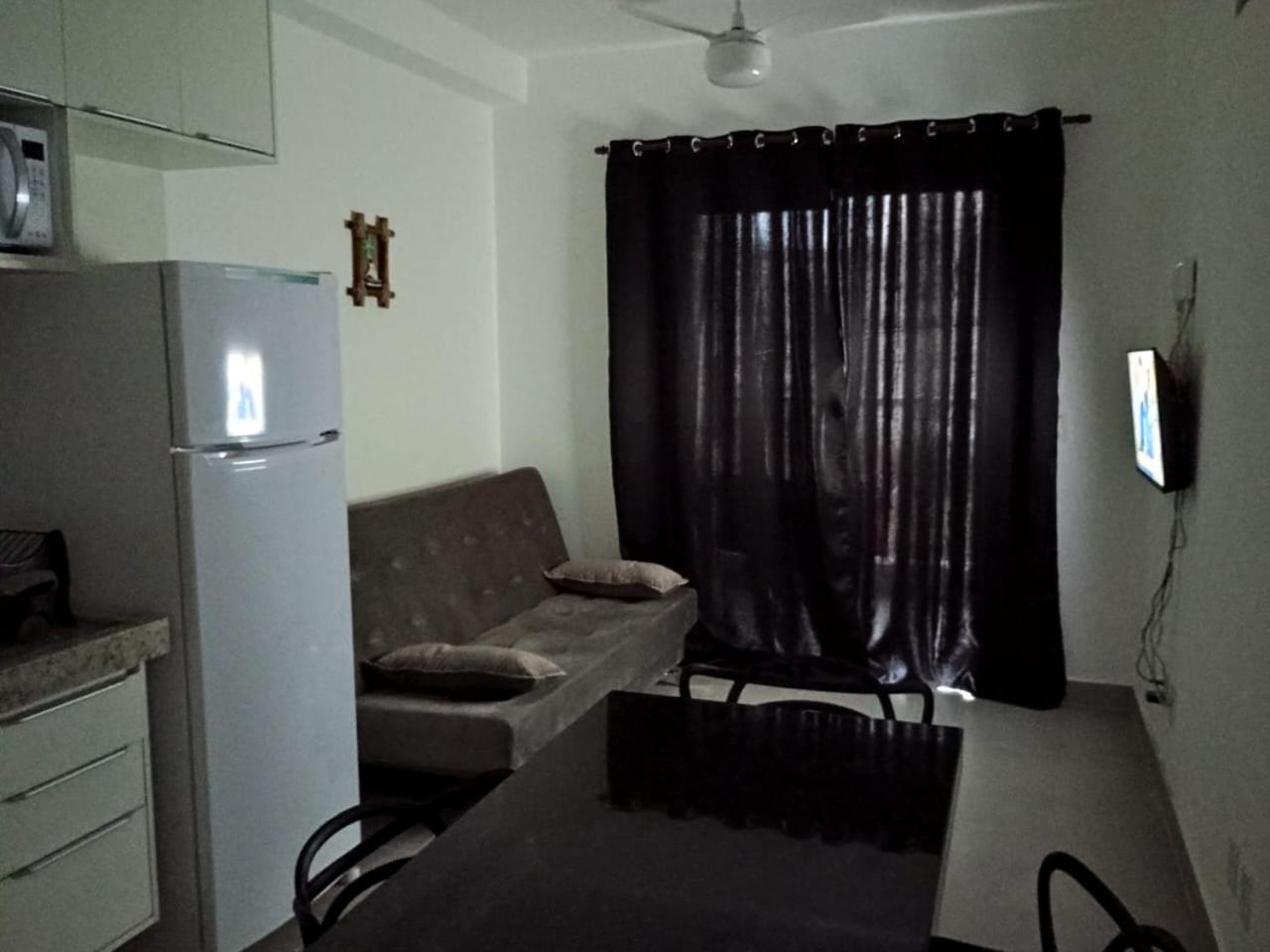 Apartamento 29 aconchegante de 1 quarto na PRAIA GRANDE, recém construido