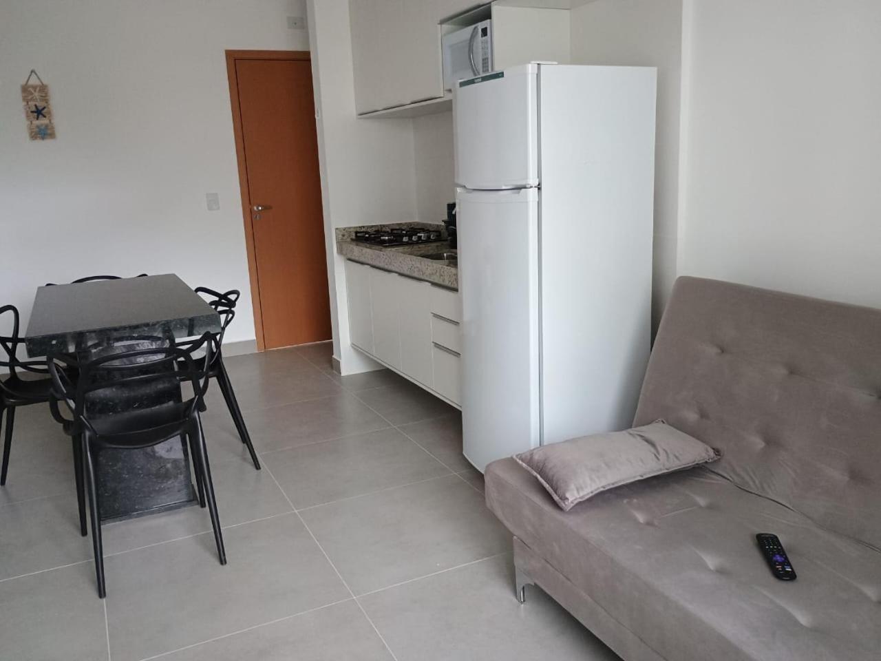 Apartamento 29 aconchegante de 1 quarto na PRAIA GRANDE, recém construido