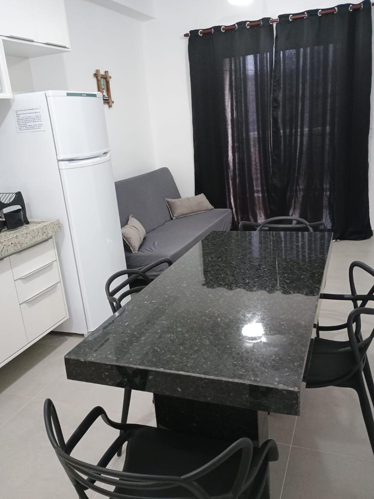 Apartamento 29 aconchegante de 1 quarto na PRAIA GRANDE, recém construido