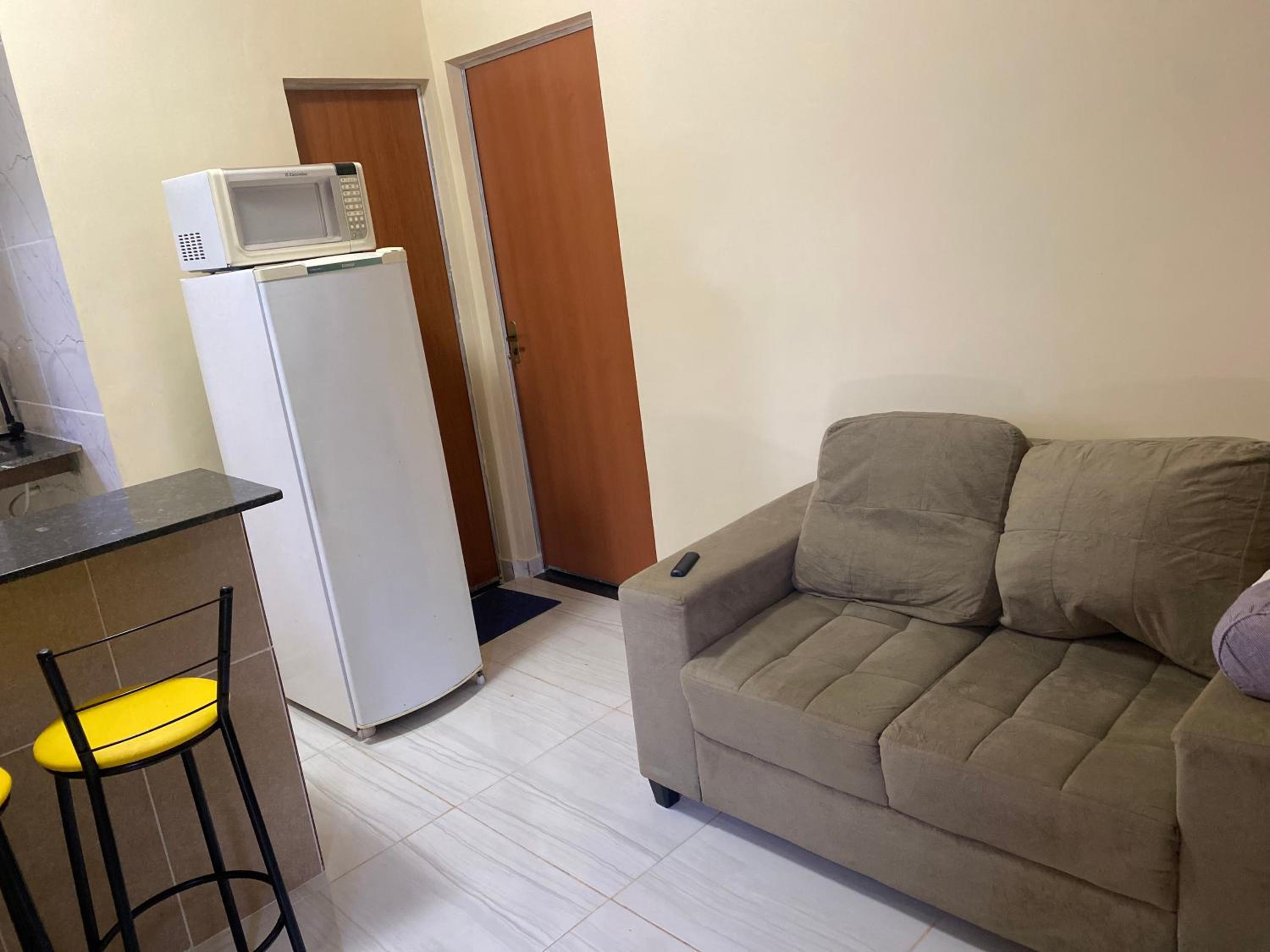 Flats com ar condicionado, garagem e internet