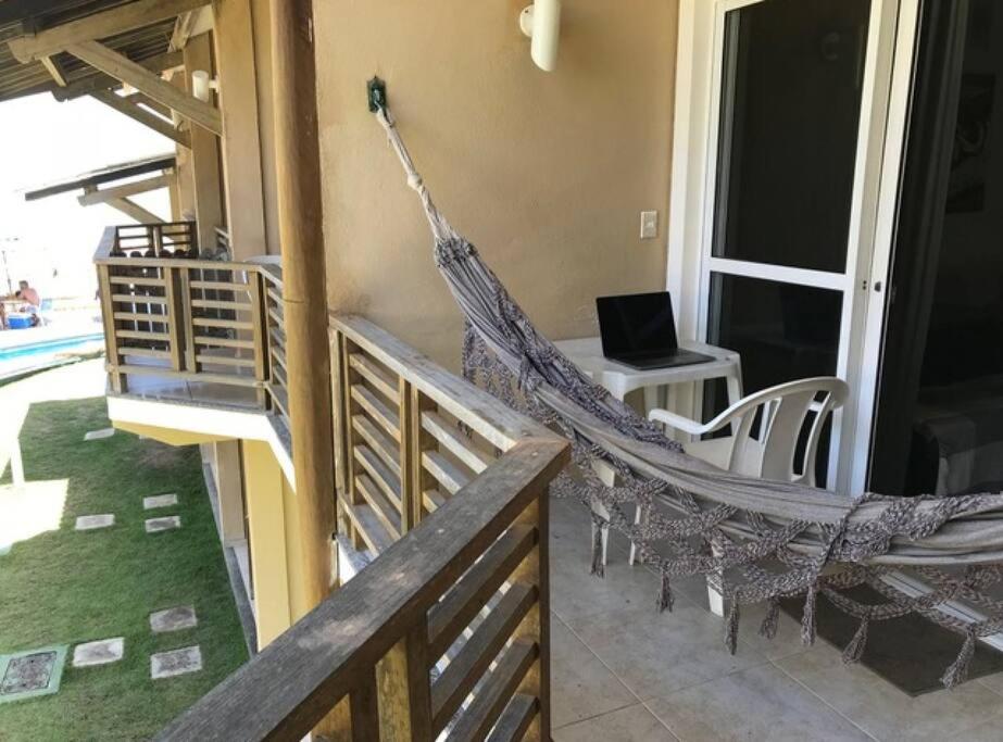 Duplex Arembepe, beira mar, piscina i wifi