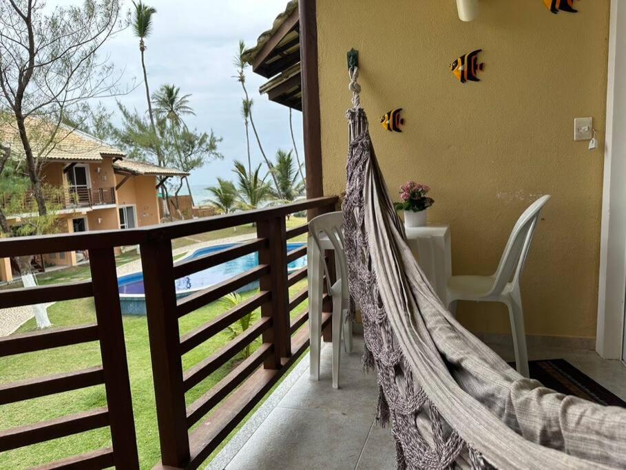 Duplex Arembepe, beira mar, piscina i wifi