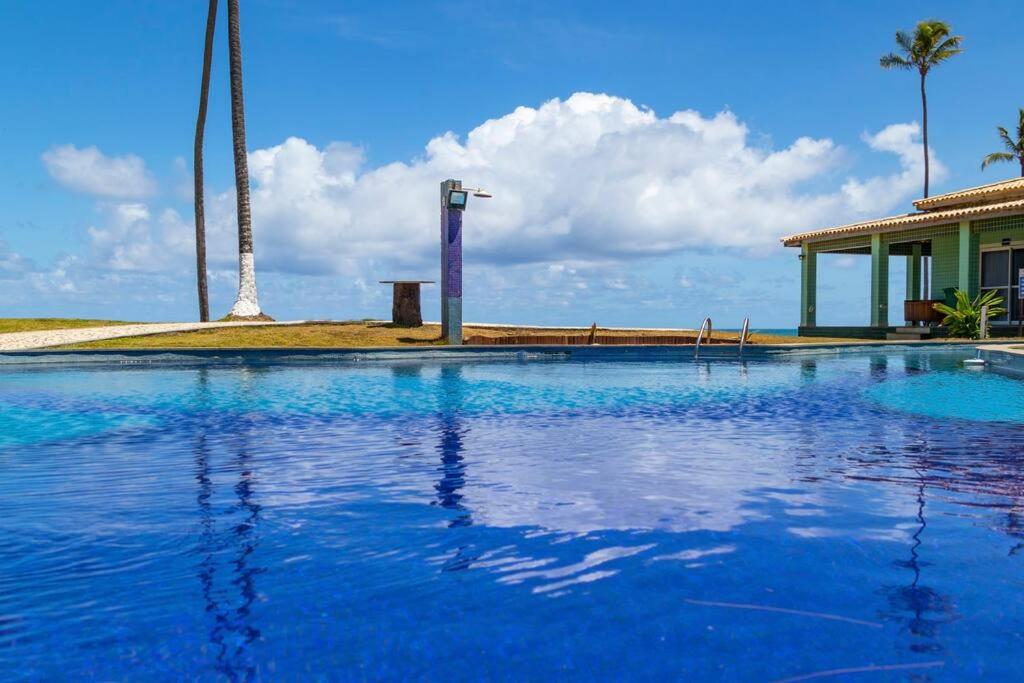 Duplex Arembepe, beira mar, piscina i wifi