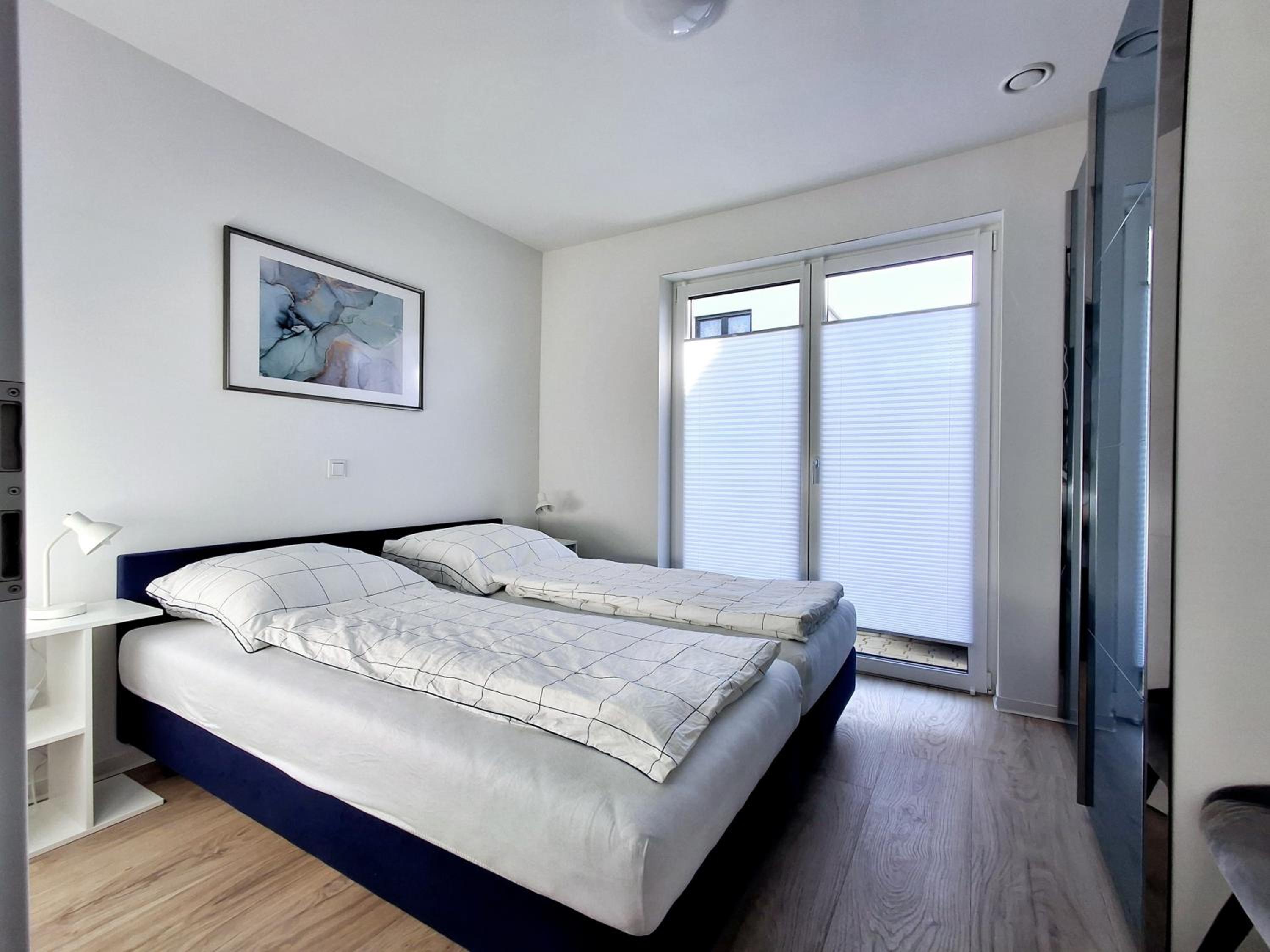 Modernes Apartment mit Terrasse & Garten, Parkplatz & 24h Self-Check-in