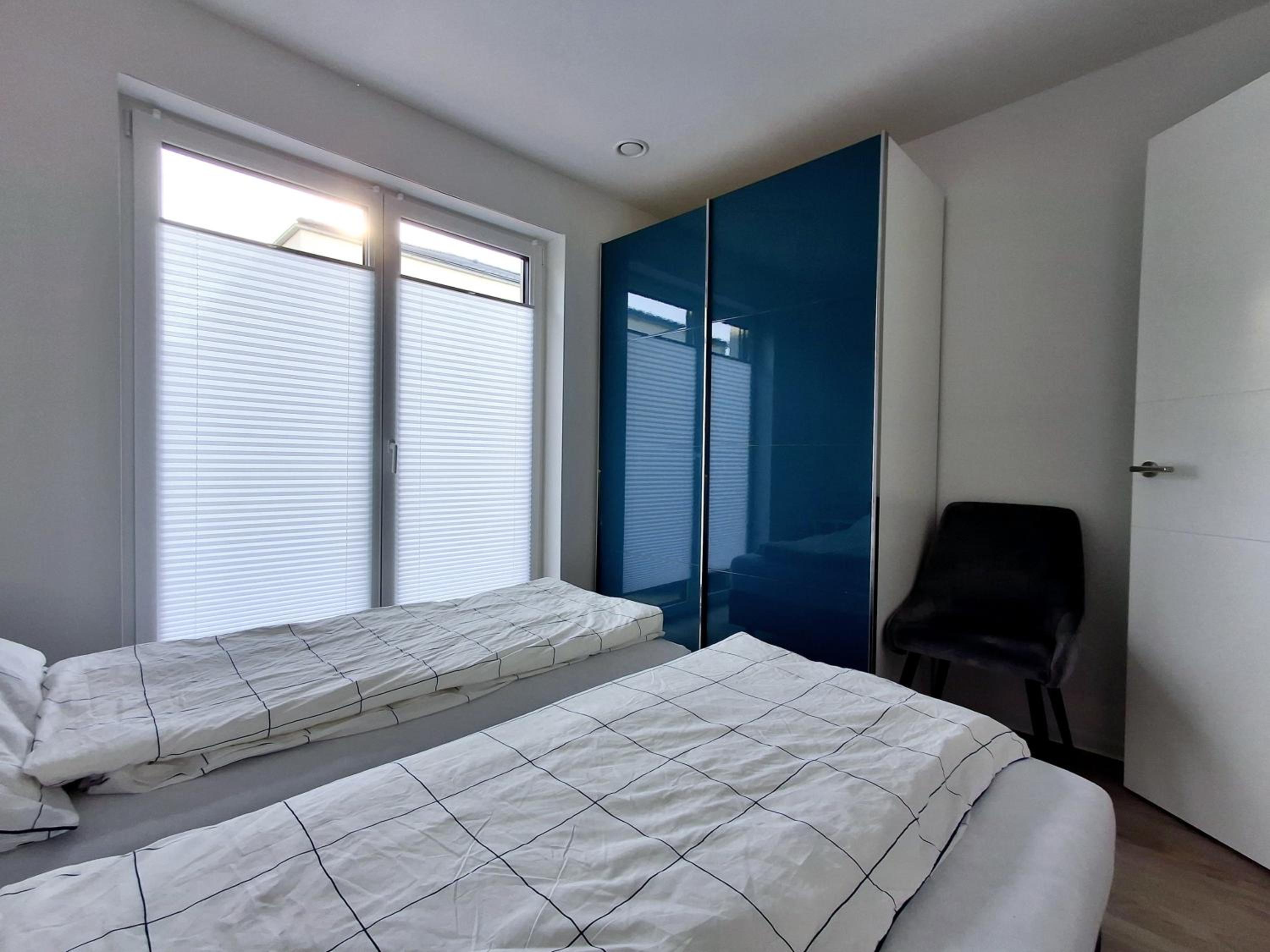 Modernes Apartment mit Terrasse & Garten, Parkplatz & 24h Self-Check-in