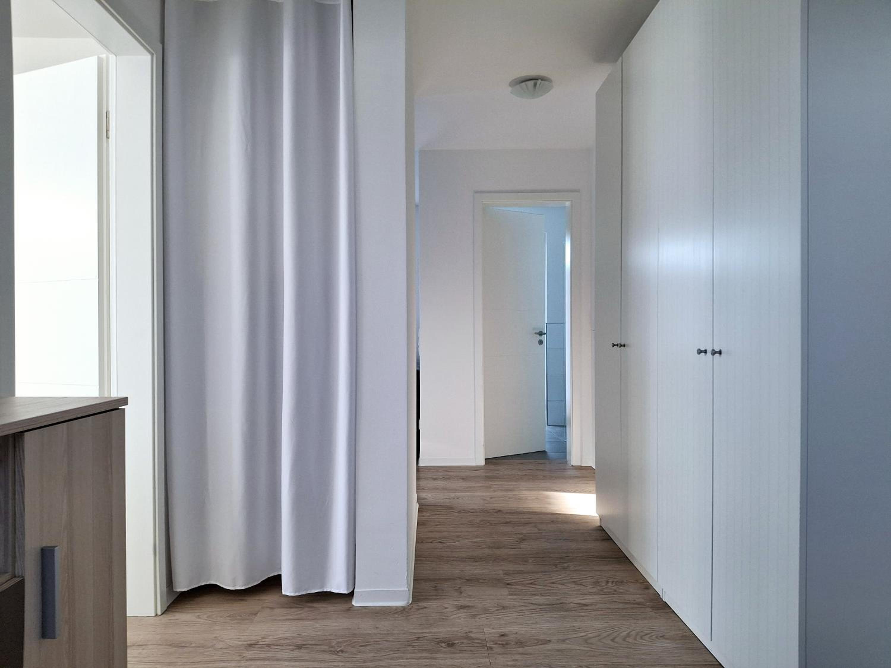 Modernes Apartment mit Terrasse & Garten, Parkplatz & 24h Self-Check-in