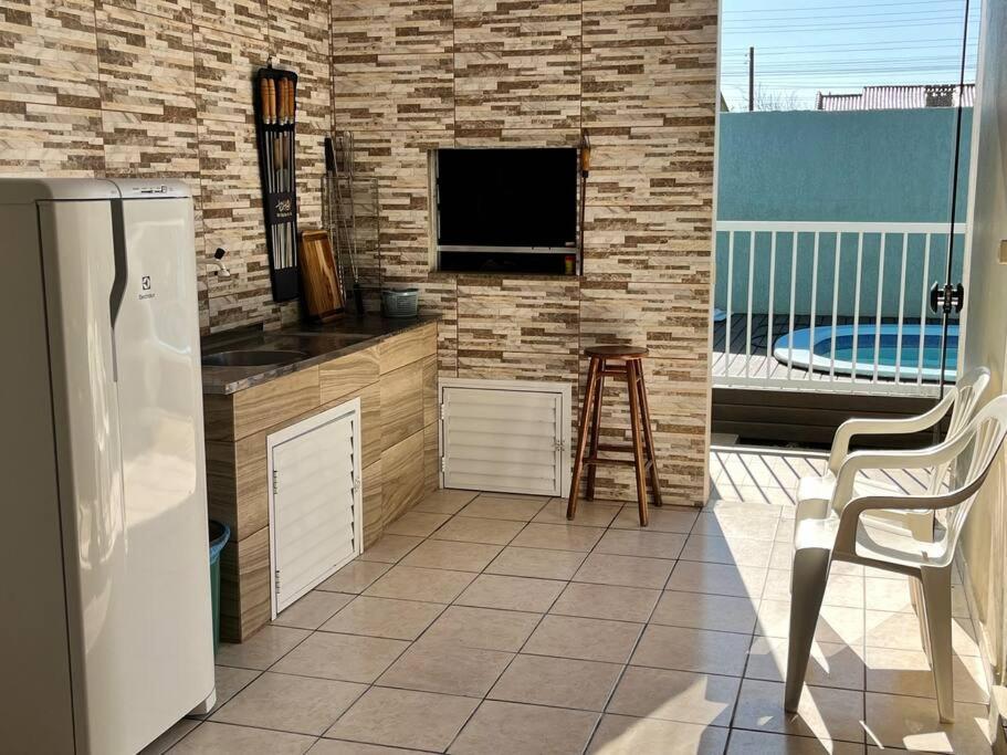 Casa com piscina próximo ao centrinho - Nova Tramandaí