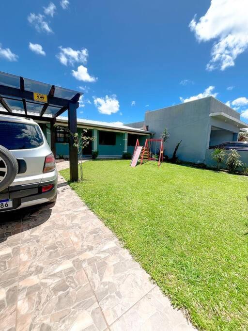 Casa com piscina próximo ao centrinho - Nova Tramandaí