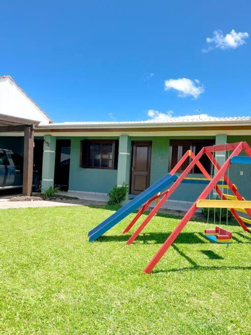 Casa com piscina próximo ao centrinho - Nova Tramandaí