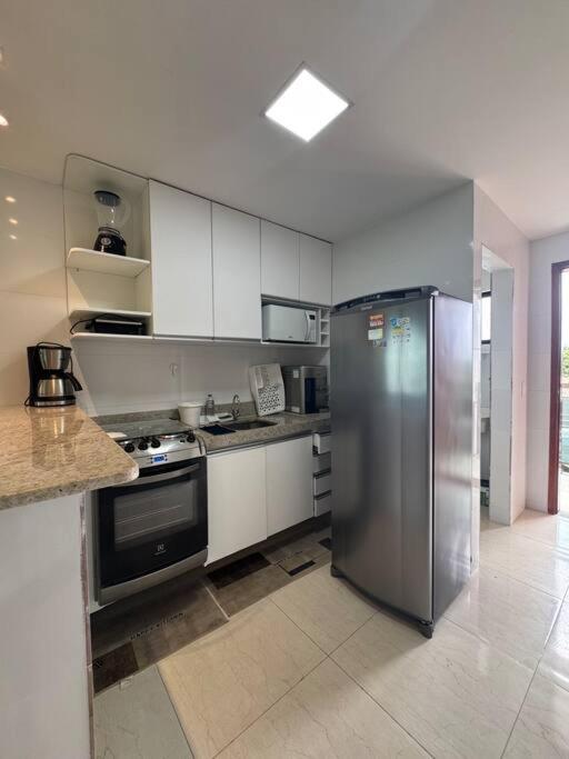 Apartamento alto padrão 7 min a pé da praia e centro