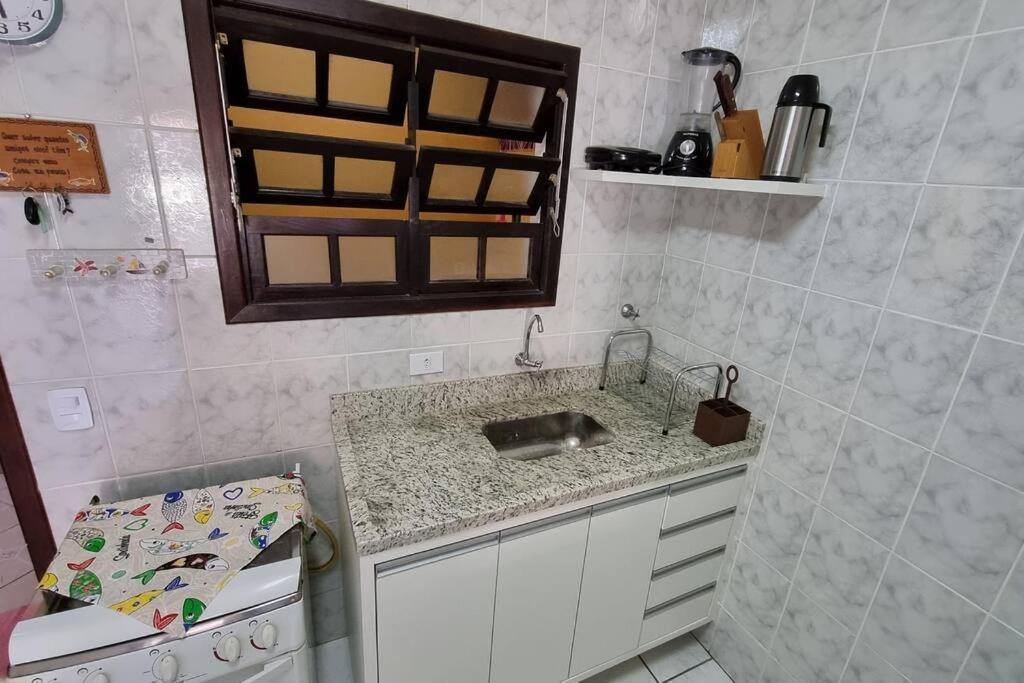 Casa confortável perto da praia Martim de Sá